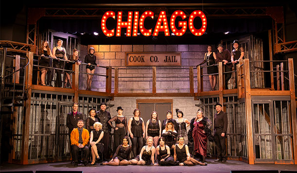 Cast members in the spring 2025 performance of Chicago, courtesy of Michael Hall Photography.