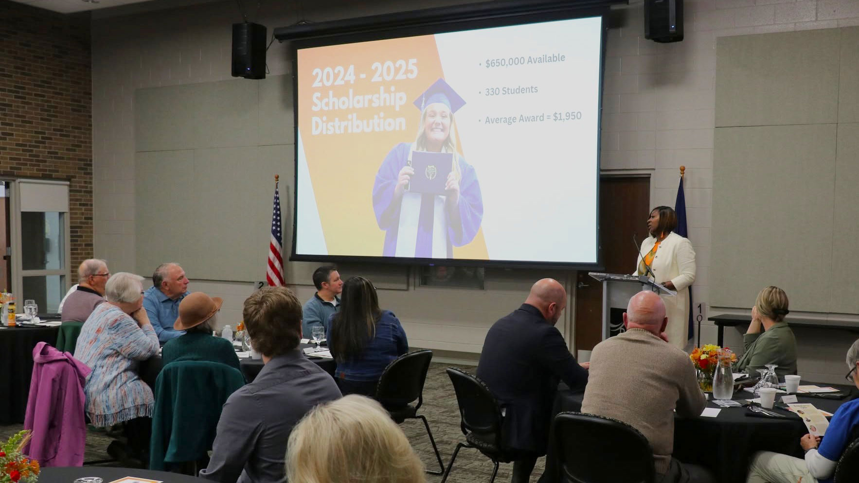 Bay College President Dr. Nerita Hughes addresses attendees during a presentation at the 2025 Building Tomorrow Together event.